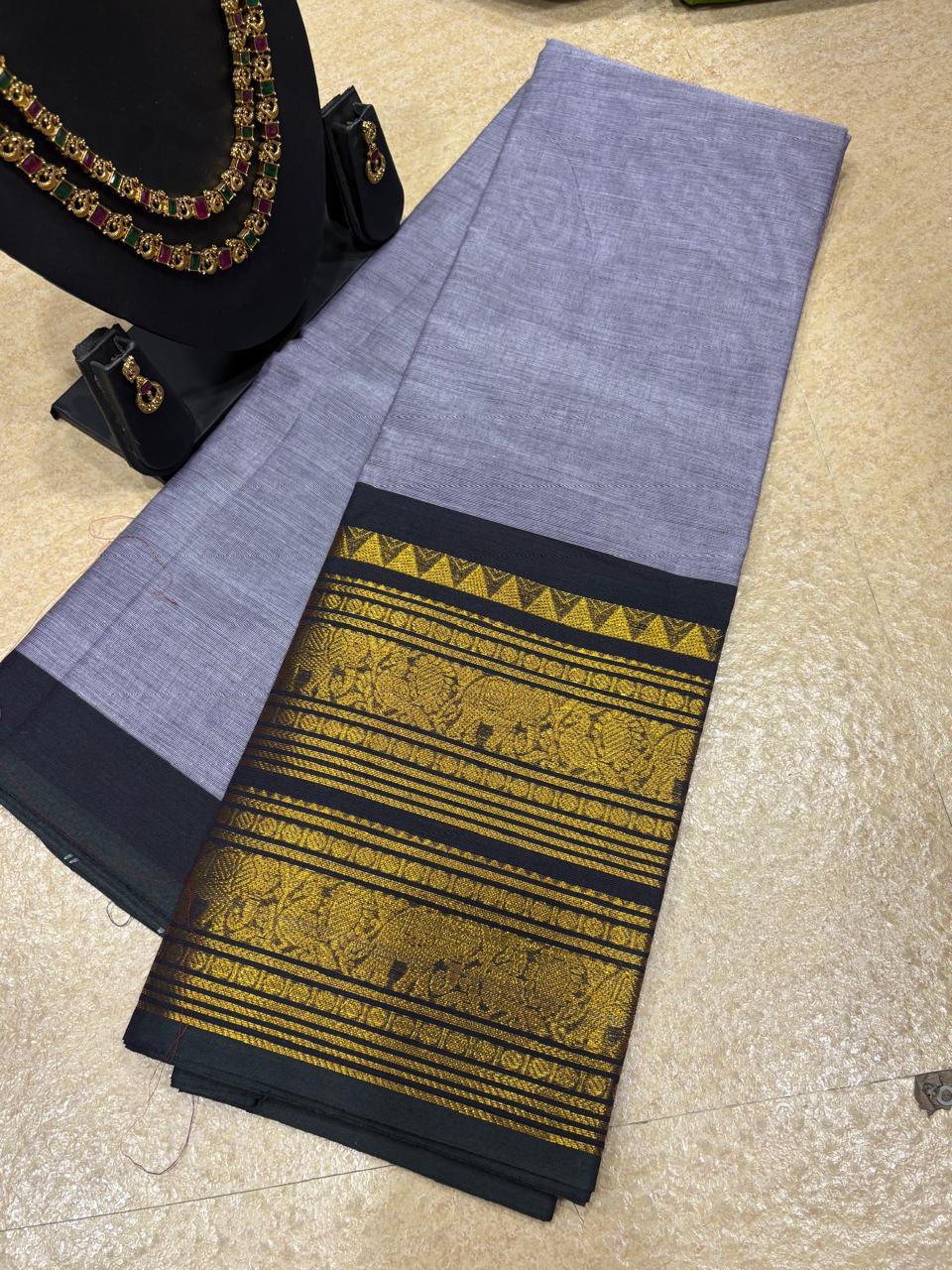 KC-MEERA: Mist Grey Kanchi Cotton Saree with Black Border