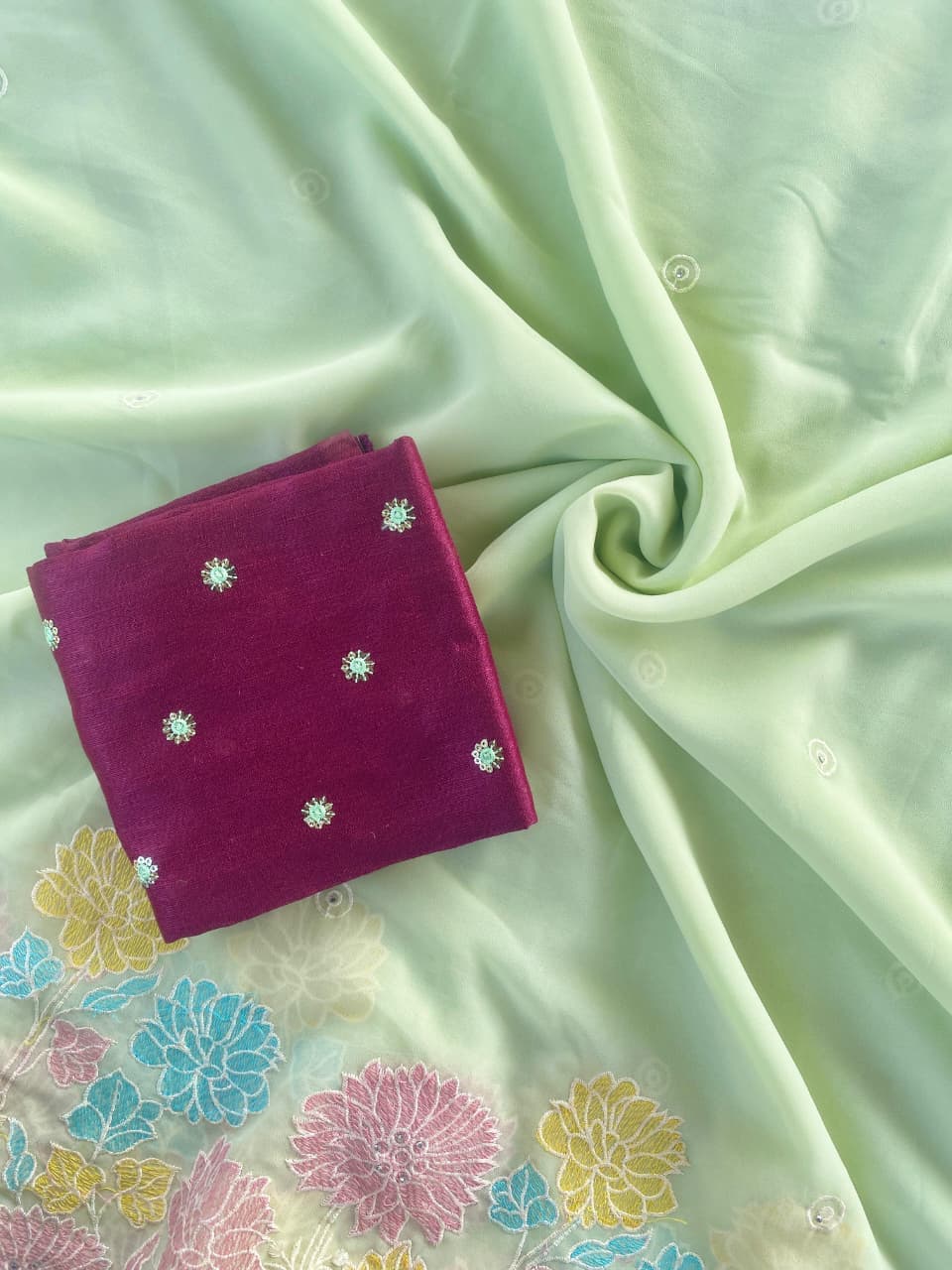 BLV-S-GC-EM-001:Pure Glass Chiffon Saree with Floral Embroidered Panel & Buttis