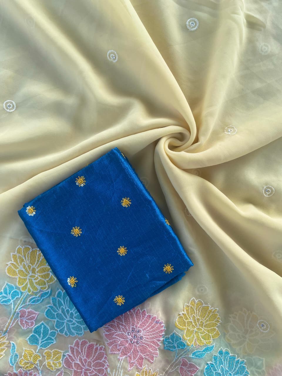 BLV-S-GC-EM-001:Pure Glass Chiffon Saree with Floral Embroidered Panel & Buttis